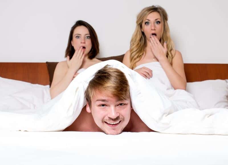 Threesome in bed
